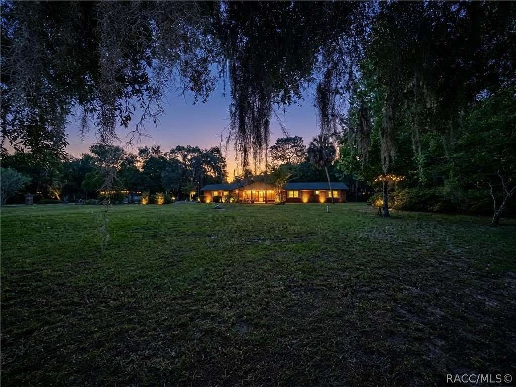 1.67 Acres of Land with Home for Sale in Inglis, Florida