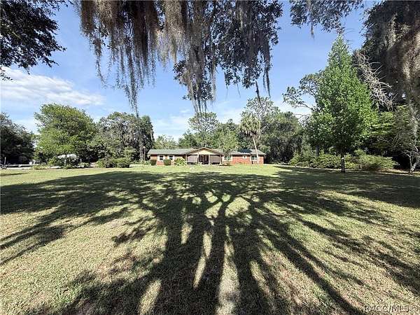 1.67 Acres of Land with Home for Sale in Inglis, Florida