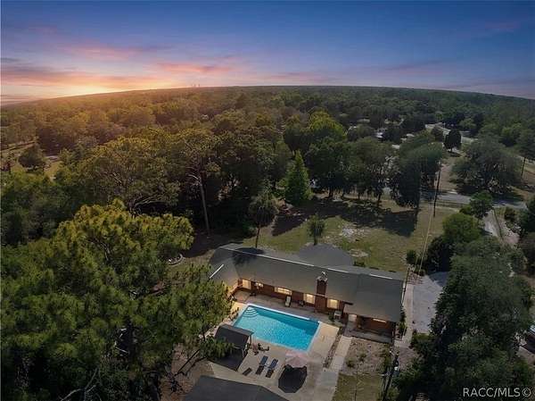 1.67 Acres of Land with Home for Sale in Inglis, Florida
