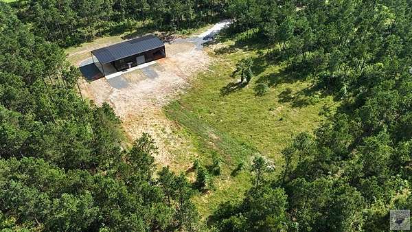 9.36 Acres of Land with Home for Sale in Queen City, Texas