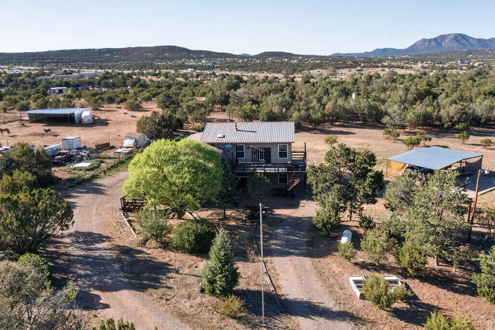 5 Acres of Land with Home for Sale in Tijeras, New Mexico