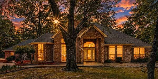 2.5 Acres of Land with Home for Sale in Powderly, Texas
