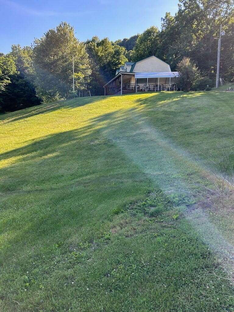 10.3 Acres of Recreational Land with Home for Sale in Hustonville, Kentucky