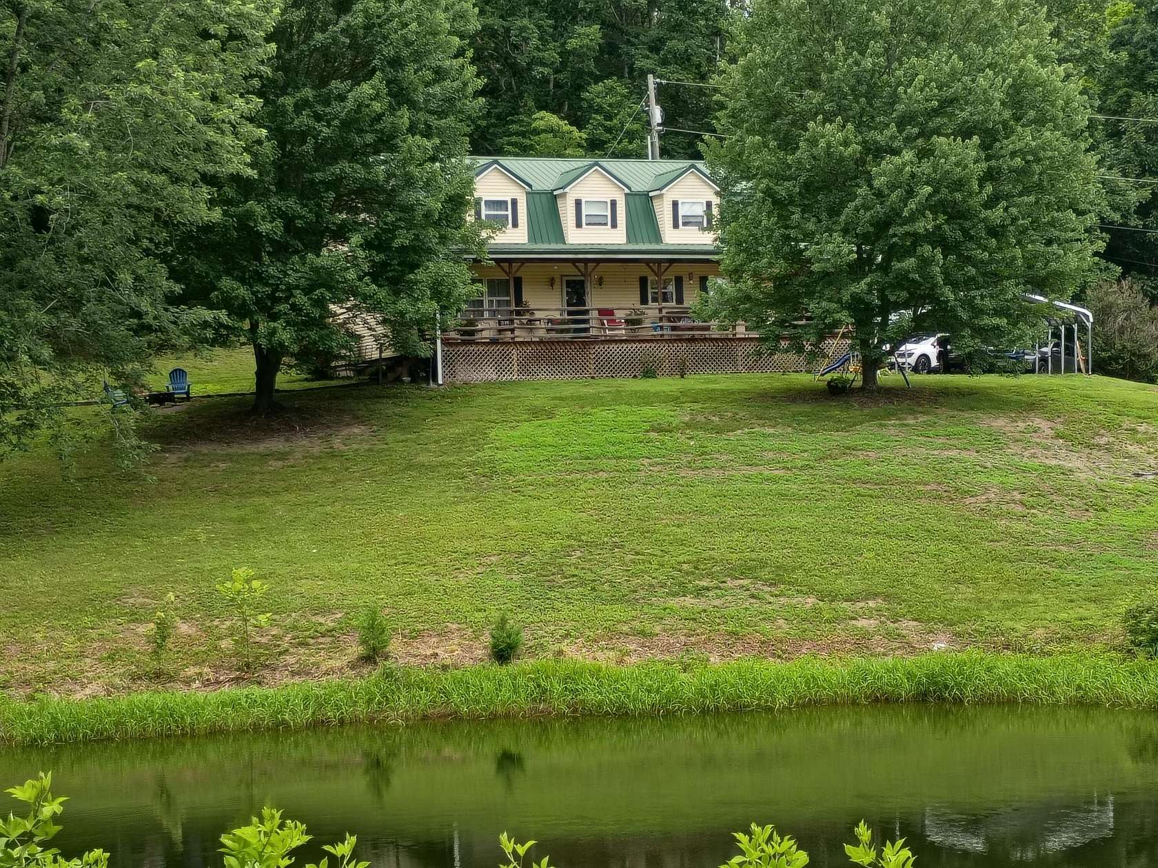 10.3 Acres of Recreational Land with Home for Sale in Hustonville, Kentucky