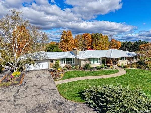 15.6 Acres of Land with Home for Sale in Unadilla Township, Michigan
