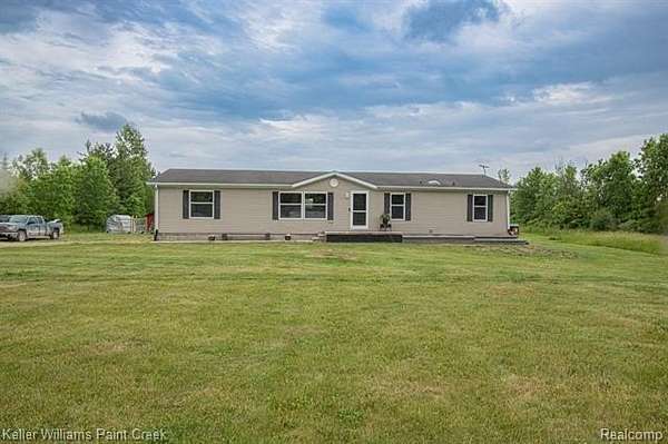 3.53 Acres of Land with Home for Sale in Wales Township, Michigan