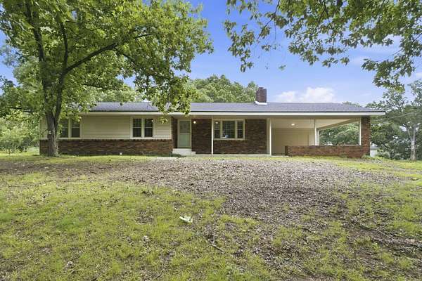17 Acres of Land with Home for Sale in Stockton, Missouri