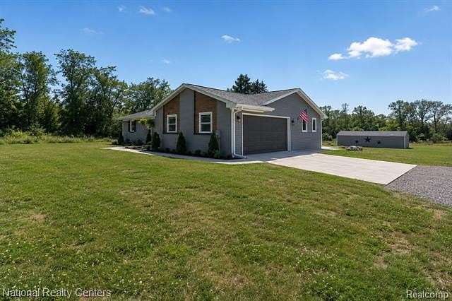 4 Acres of Land with Home for Sale in Highland Township, Michigan