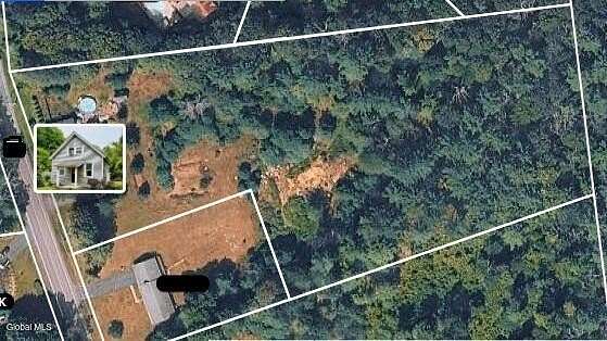 4.38 Acres of Land with Home for Sale in Queensbury, New York