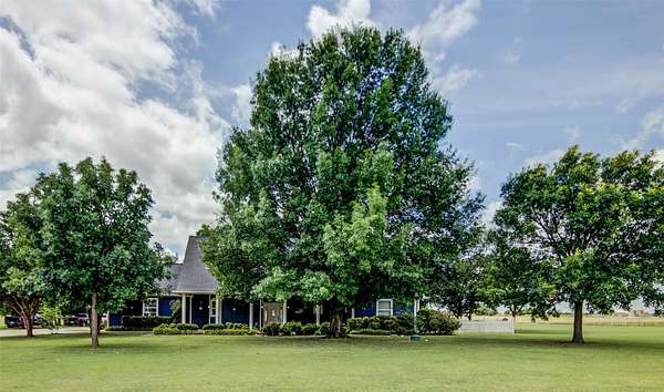 8 Acres of Land with Home for Sale in Krum, Texas