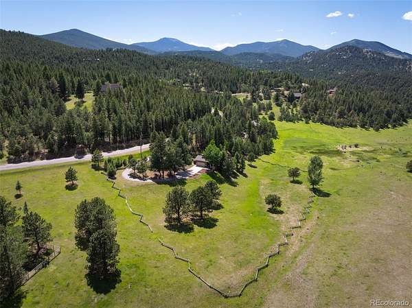5 Acres of Land with Home for Sale in Evergreen, Colorado