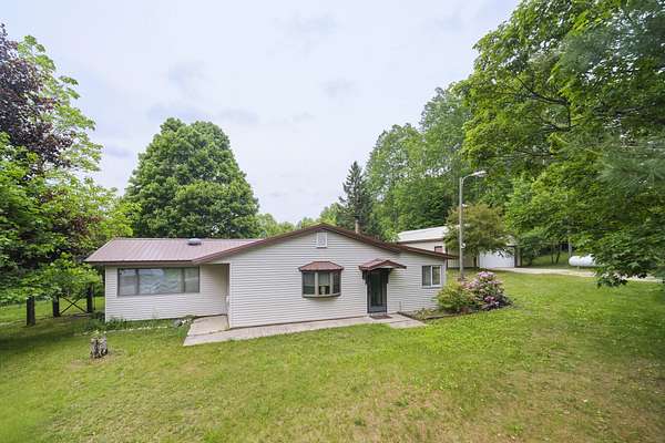 6.83 Acres of Land with Home for Sale in Bear Lake, Michigan