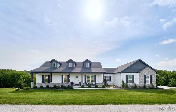 2 Acres of Land with Home for Sale in Hawk Point, Missouri