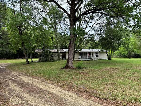 2.35 Acres of Land with Home for Sale in Williston, Florida