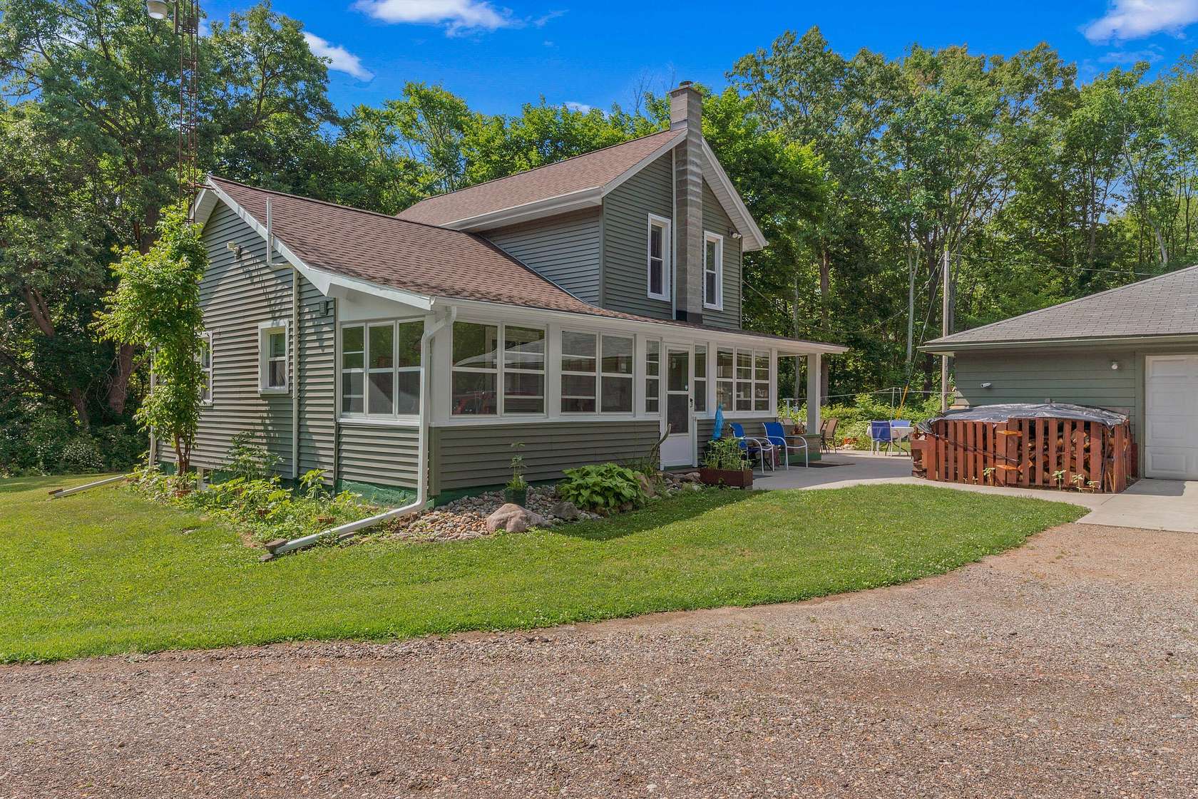 20 Acres of Recreational Land with Home for Sale in Rives Junction, Michigan