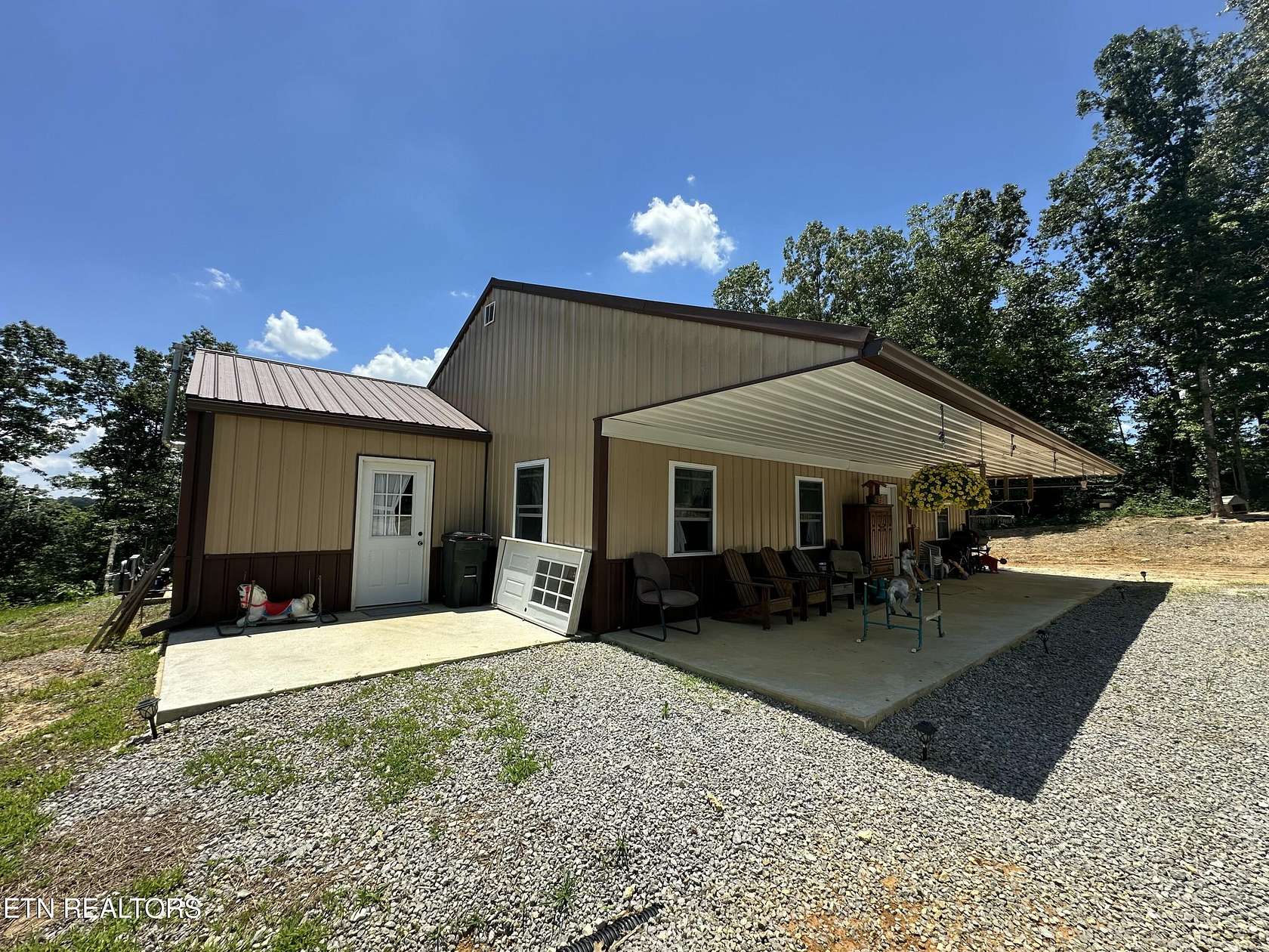 6.6 Acres of Land with Home for Sale in Sunbright, Tennessee