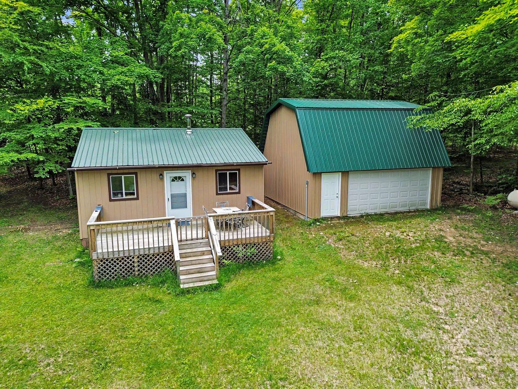 40 Acres of Land with Home for Sale in Fairview, Michigan
