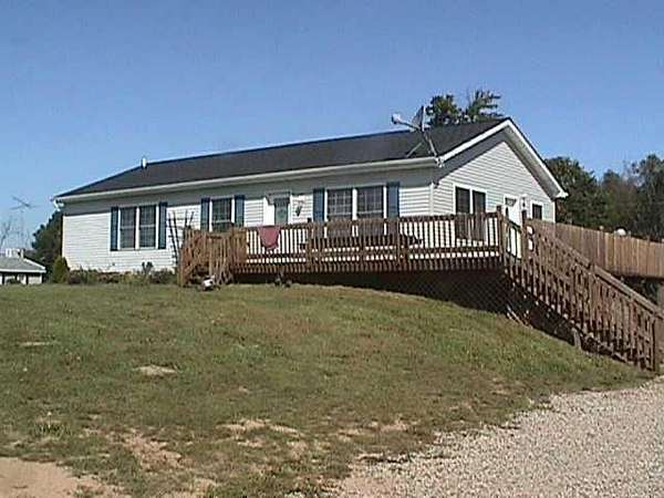 4 Acres of Land with Home for Sale in Grass Lake, Michigan