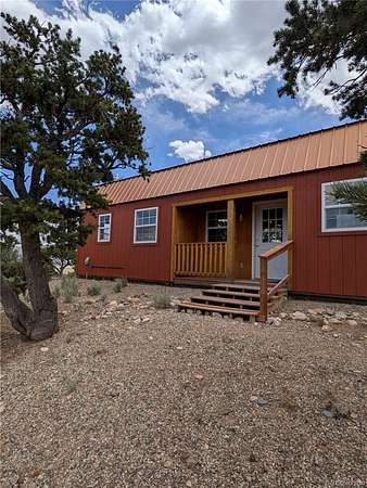 10.2 Acres of Recreational Land with Home for Sale in Fort Garland, Colorado