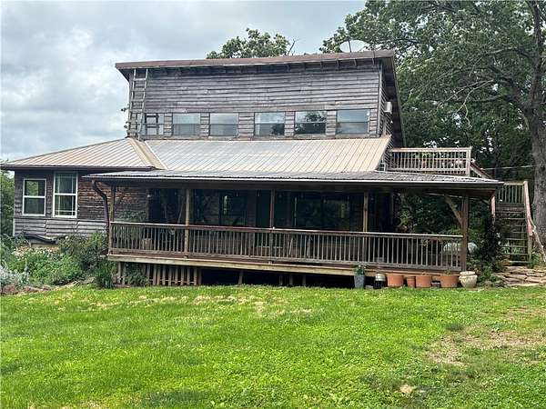 40 Acres of Land with Home for Sale in Pettigrew, Arkansas