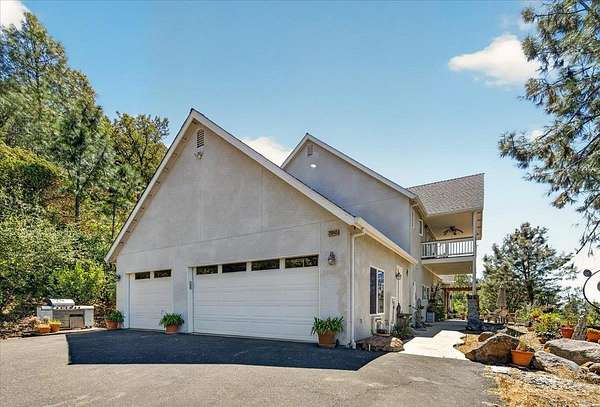 6.44 Acres of Land with Home for Sale in Tollhouse, California