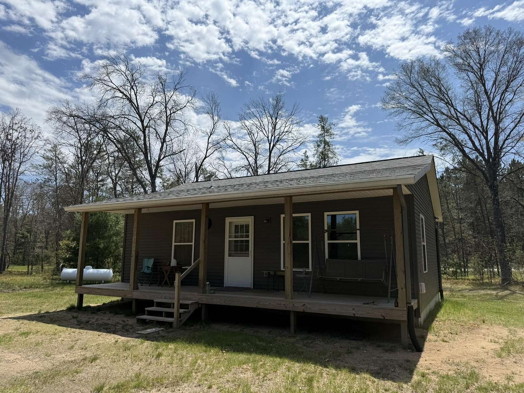 20 Acres of Land with Home for Sale in Irons, Michigan