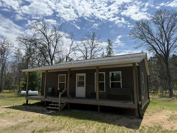 20 Acres of Land with Home for Sale in Irons, Michigan