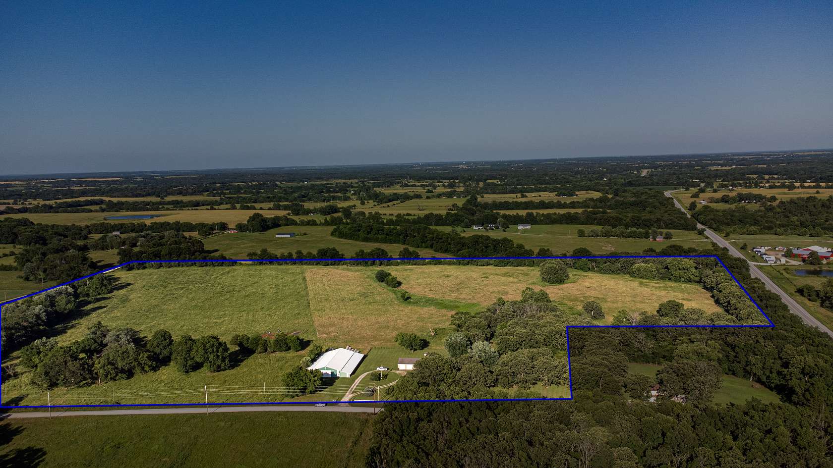 59.5 Acres of Land with Home for Sale in Walker, Missouri
