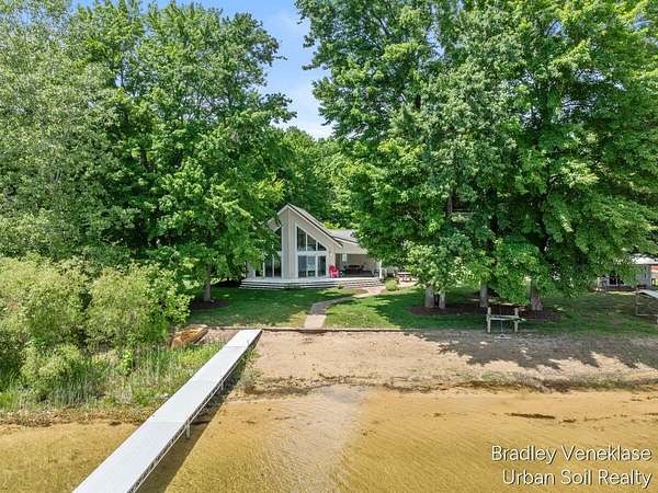 2.69 Acres of Land with Home for Sale in Grant, Michigan
