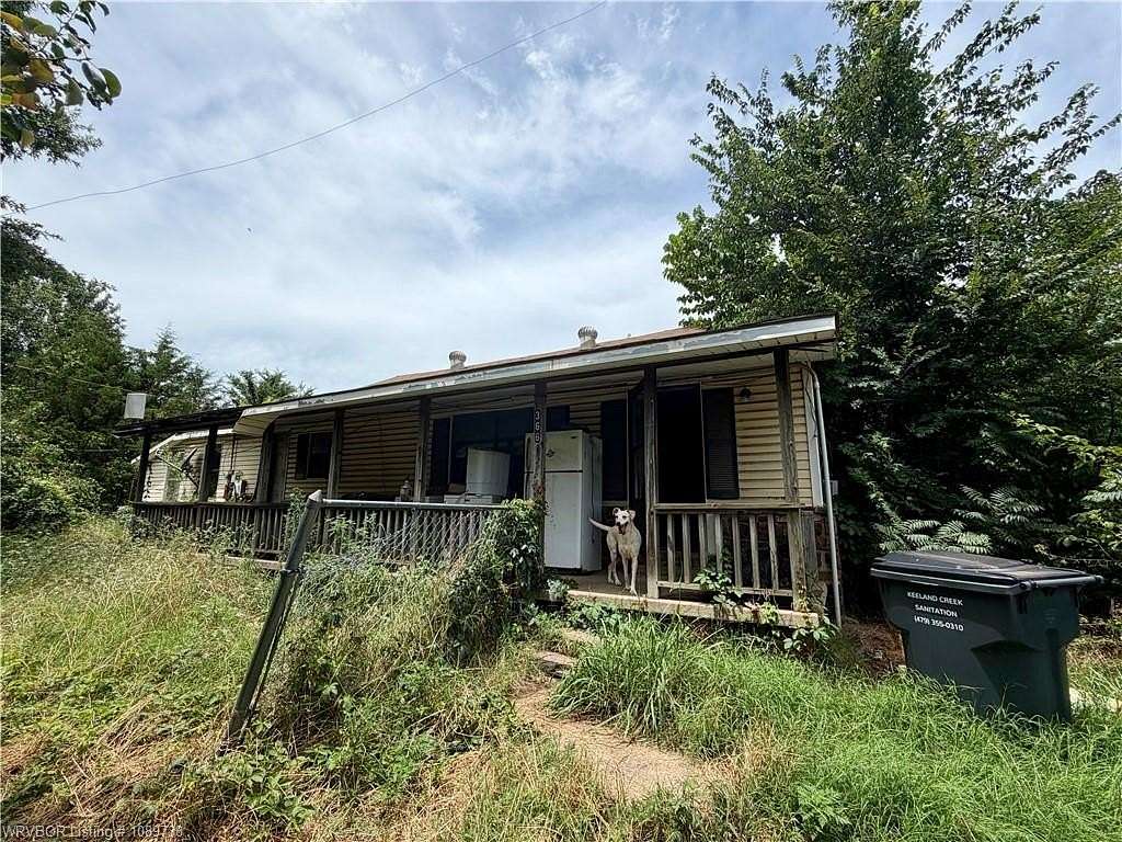 7 Acres of Land with Home for Sale in Magazine, Arkansas