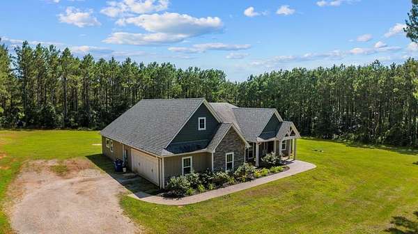 5.26 Acres of Land with Home for Sale in Douglass, Texas