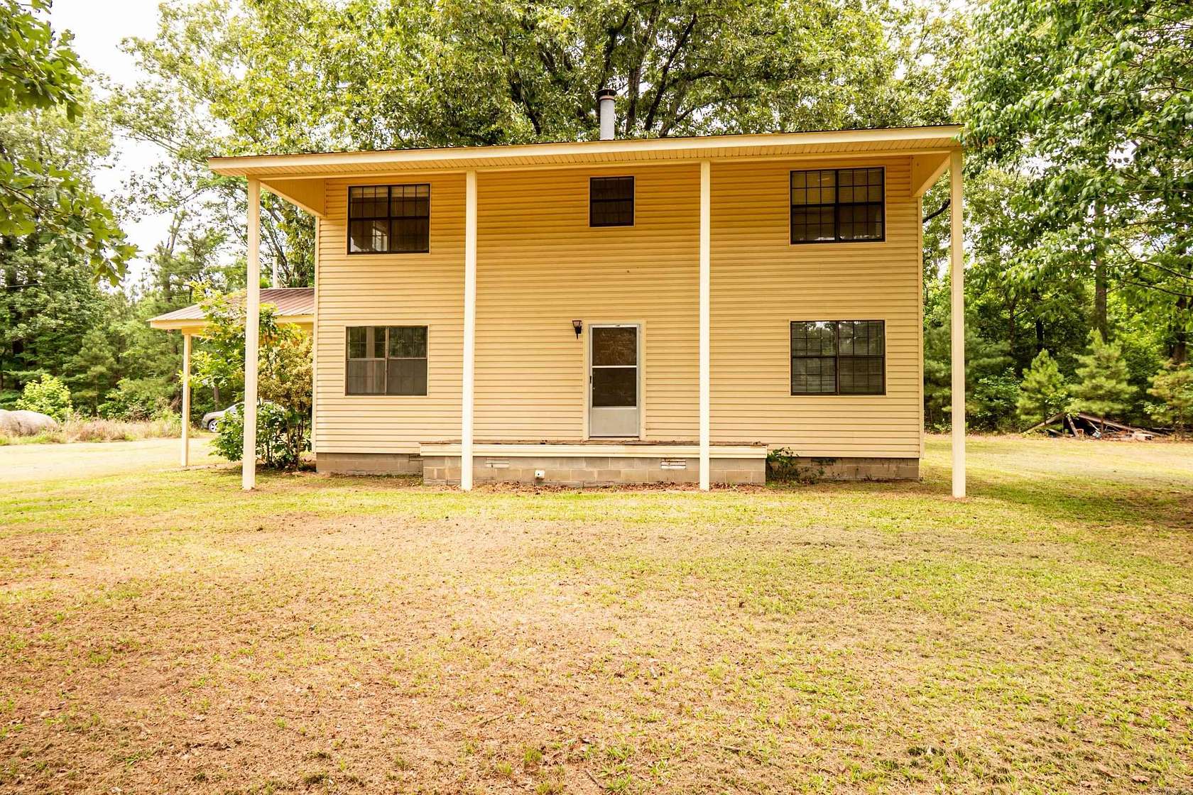 12.3 Acres of Land with Home for Sale in Wilmar, Arkansas