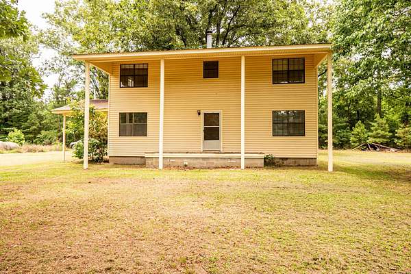 12.3 Acres of Land with Home for Sale in Wilmar, Arkansas