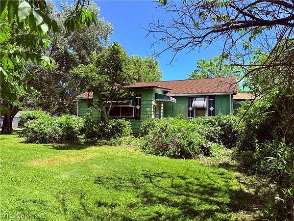 5 Acres of Land with Home for Sale in Madison, Ohio