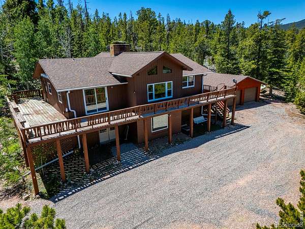 2.33 Acres of Land with Home for Sale in Red Feather Lakes, Colorado