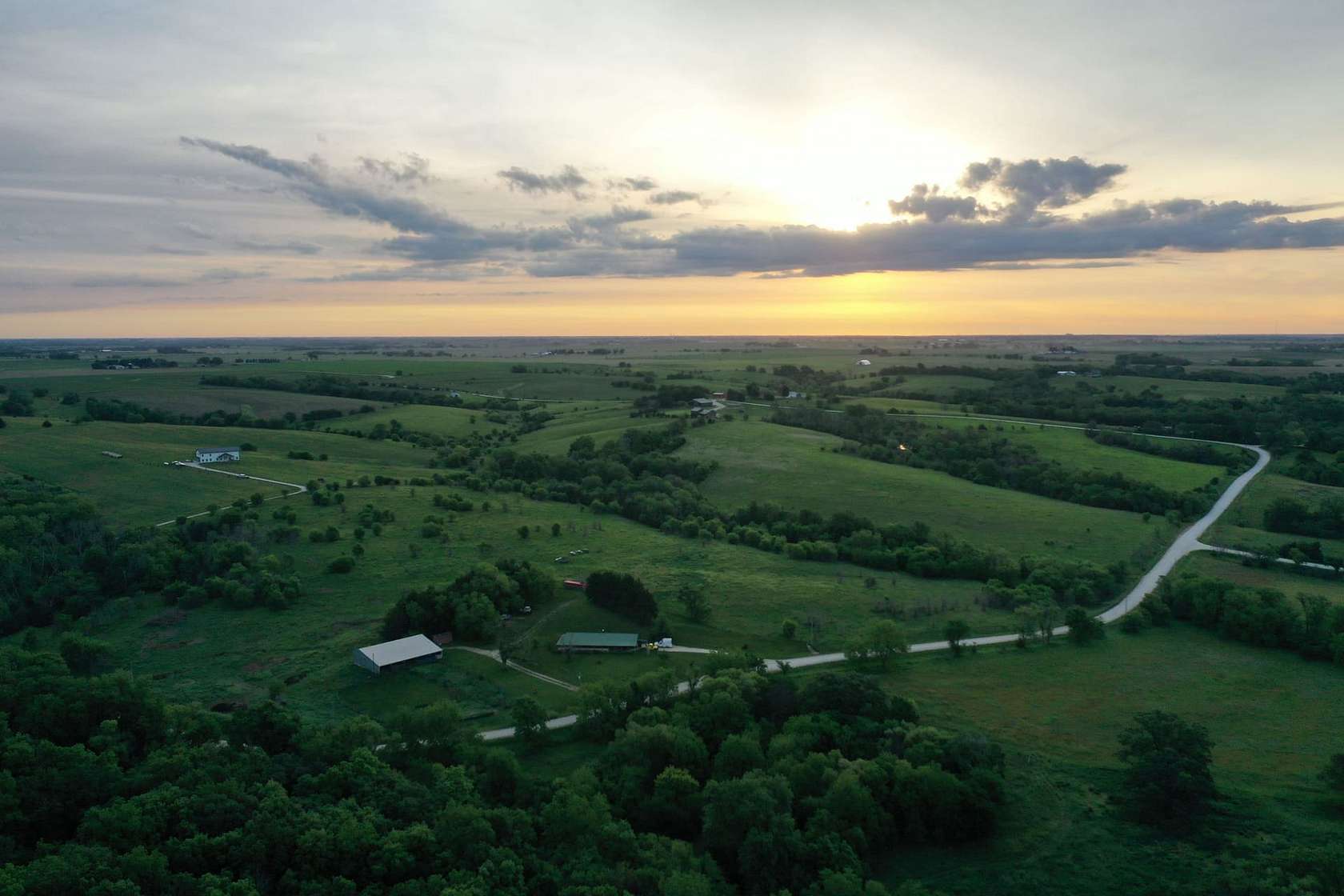 75.3 Acres of Land with Home for Auction in Winterset, Iowa