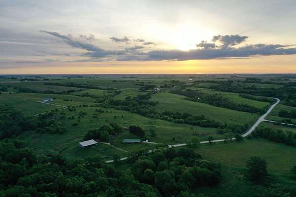 75.3 Acres of Land with Home for Auction in Winterset, Iowa