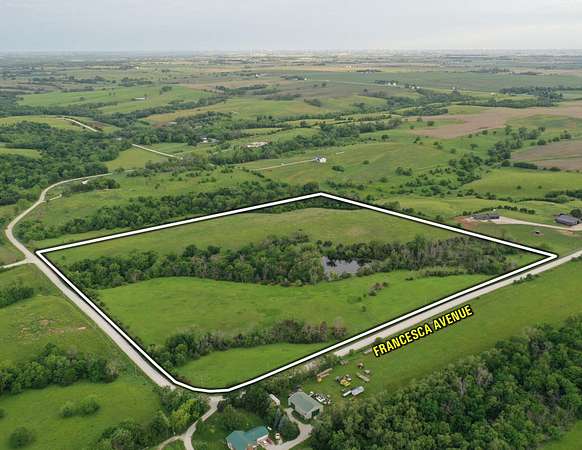 75.3 Acres of Land with Home for Auction in Winterset, Iowa