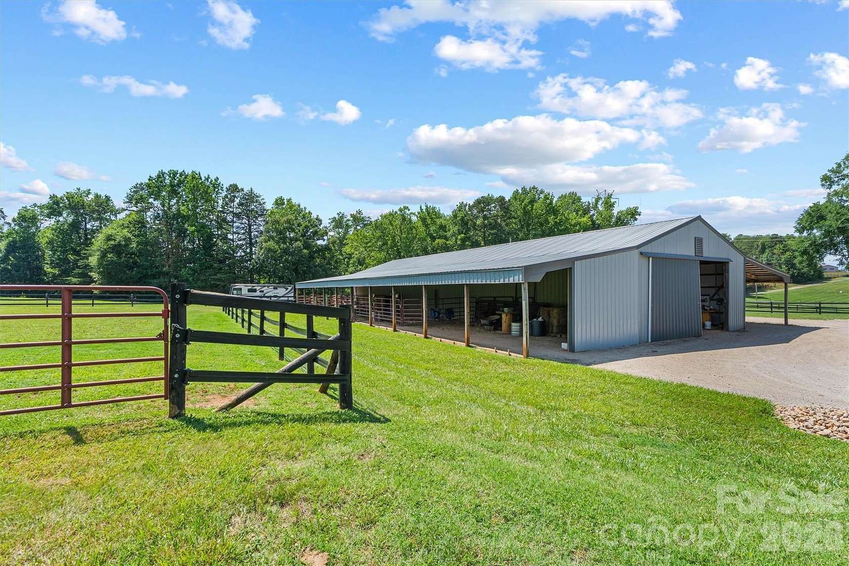 6.79 Acres of Land with Home for Sale in Mooresville, North Carolina
