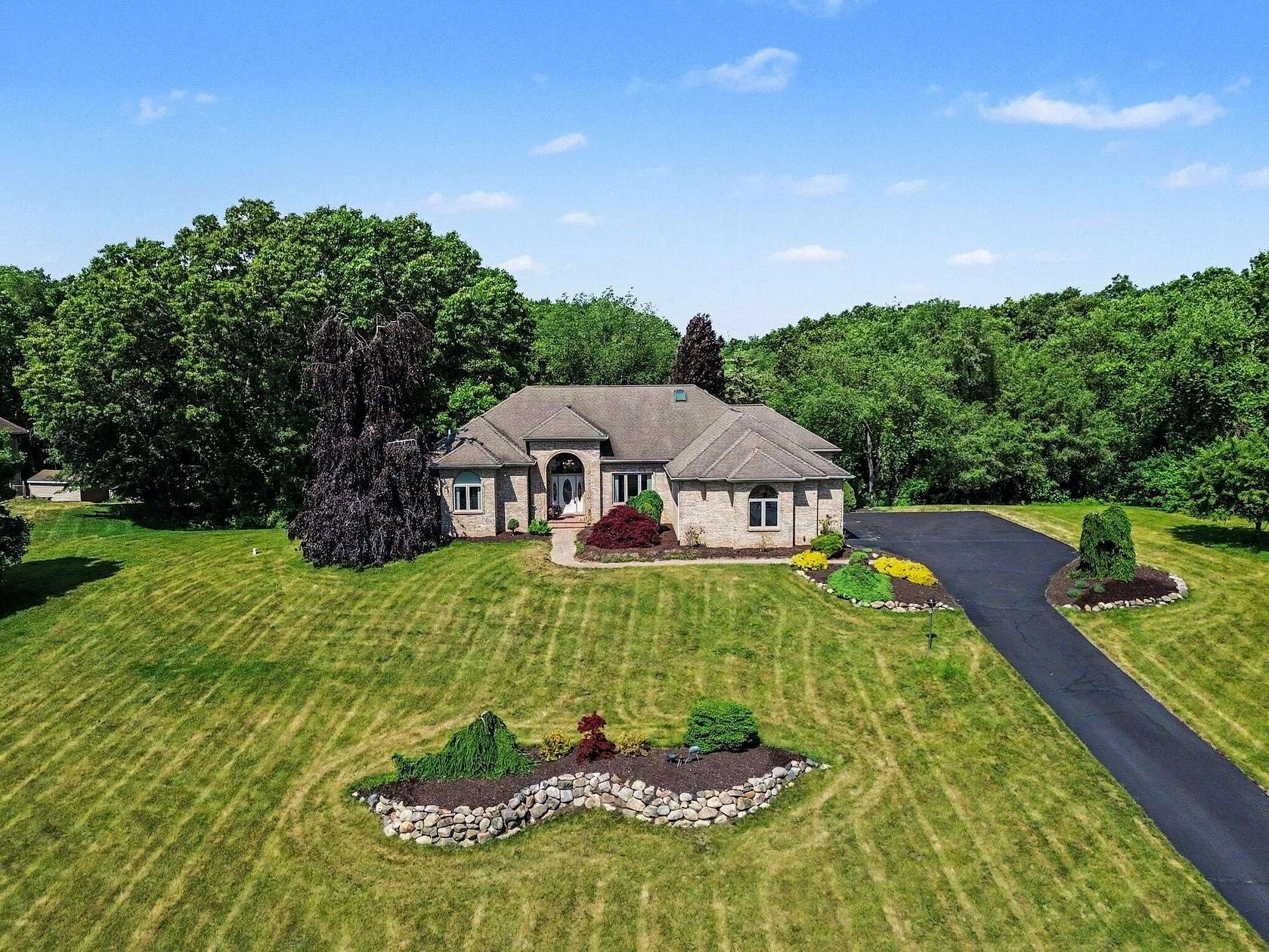 2 Acres of Land with Home for Sale in Chelsea, Michigan
