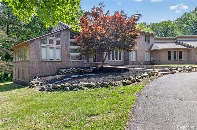 10.5 Acres of Land with Home for Sale in Green Oak Township, Michigan