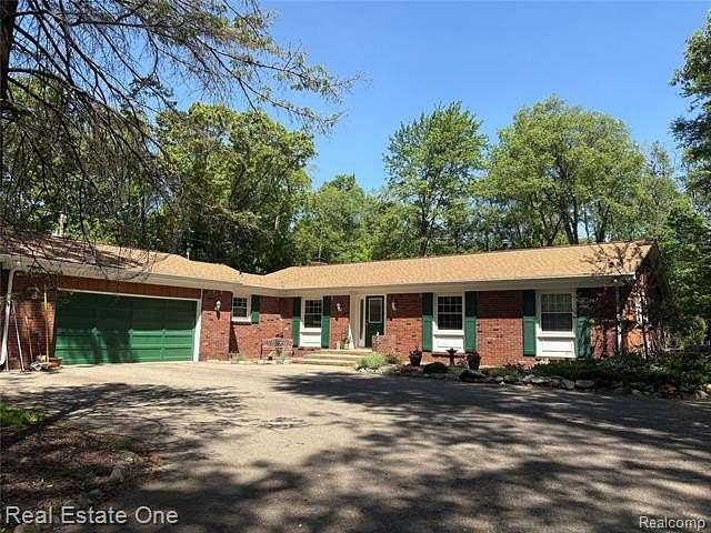 2.5 Acres of Land with Home for Sale in Groveland Township, Michigan