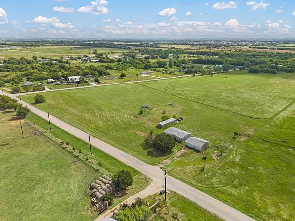 5 Acres of Land with Home for Sale in Justin, Texas