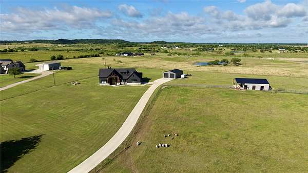 10 Acres of Land with Home for Sale in Grandview, Texas