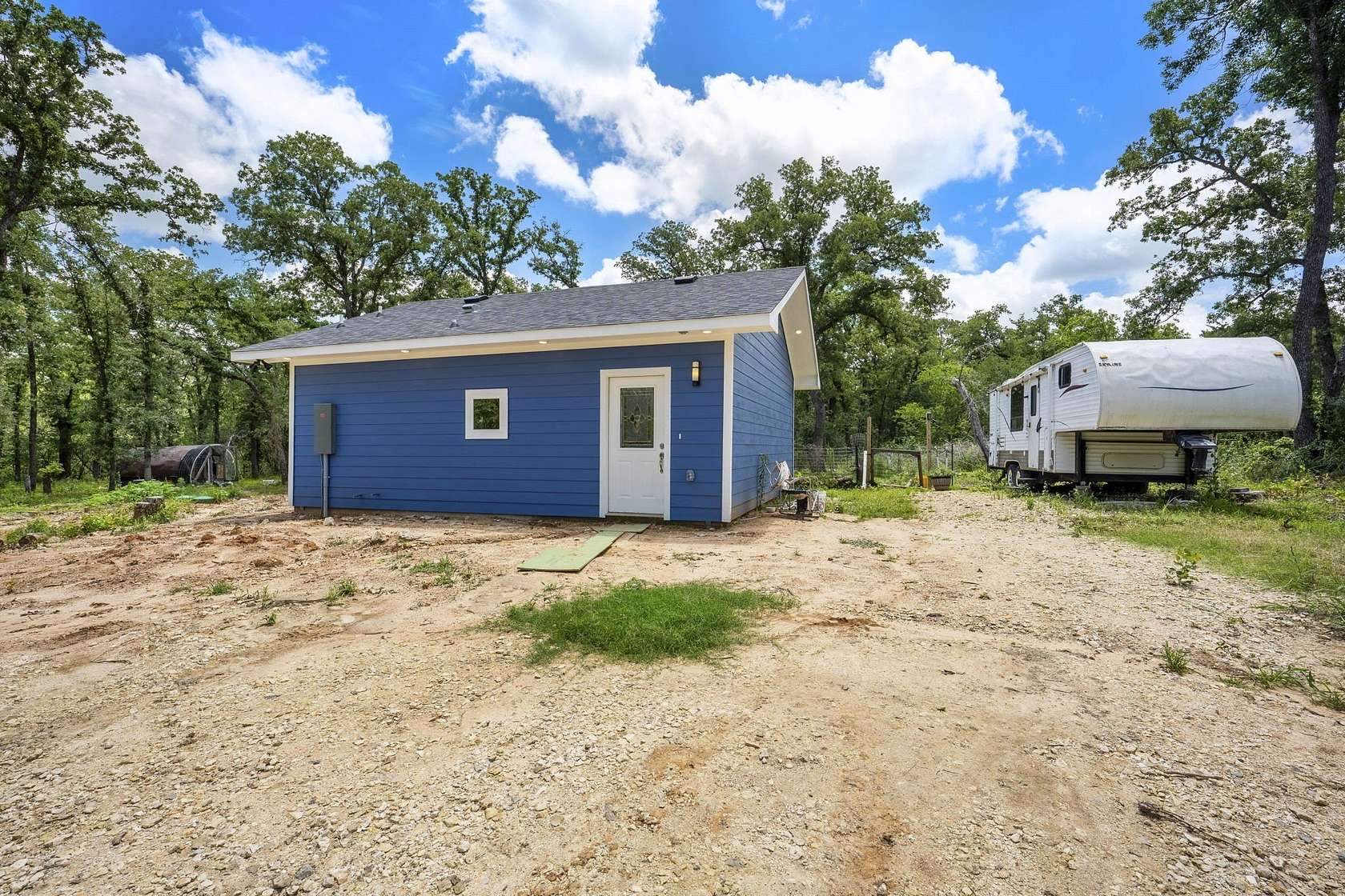 10 Acres of Land with Home for Sale in Buckholts, Texas