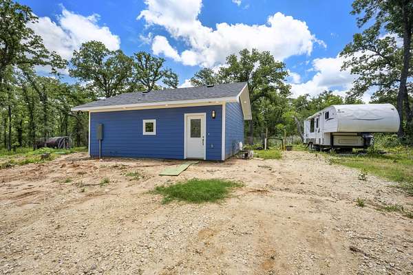 10 Acres of Land with Home for Sale in Buckholts, Texas