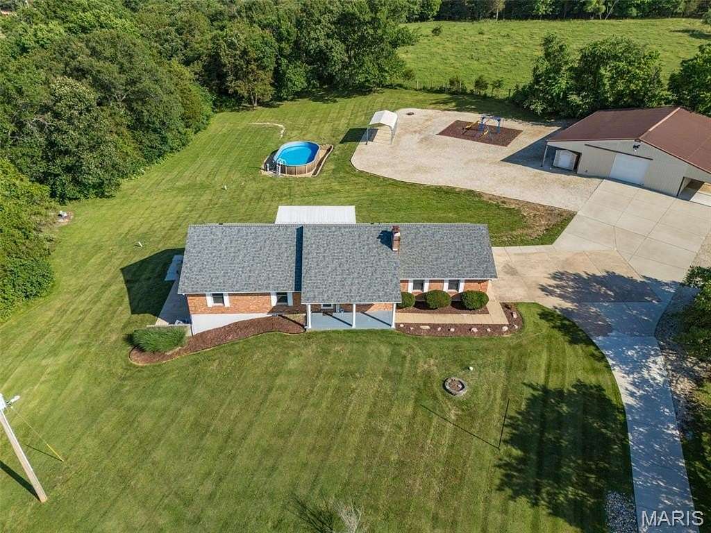 7 Acres of Land with Home for Sale in De Soto, Missouri
