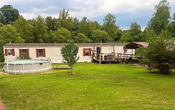 2 Acres of Land with Home for Sale in Tobaccoville, North Carolina