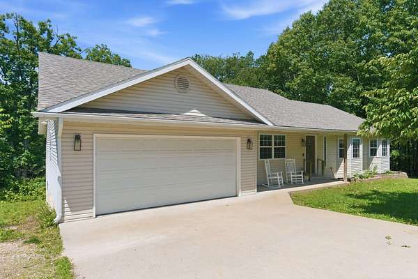 2.34 Acres of Land with Home for Sale in Reeds Spring, Missouri