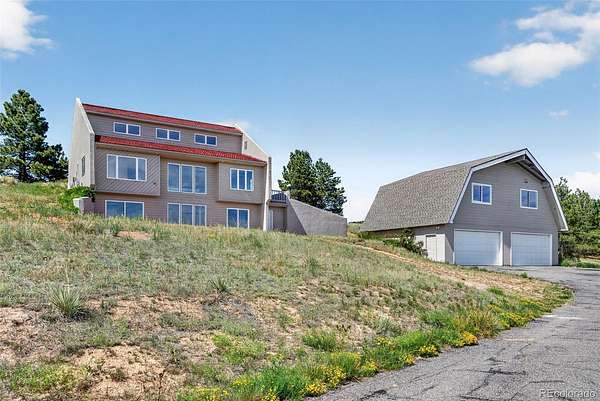 1.87 Acres of Land with Home for Sale in Aurora, Colorado